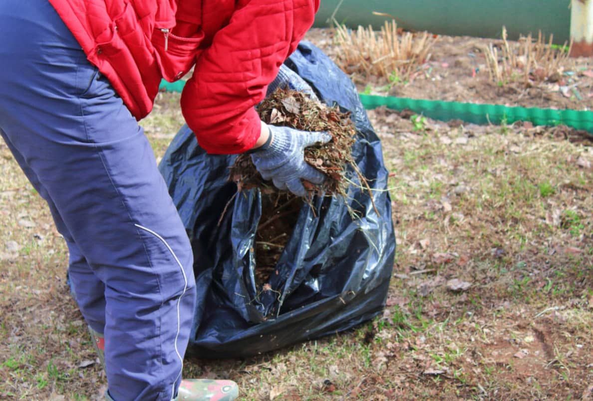 Garden Bag being filled with green waste