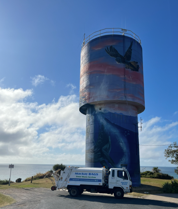 Truck near water tower